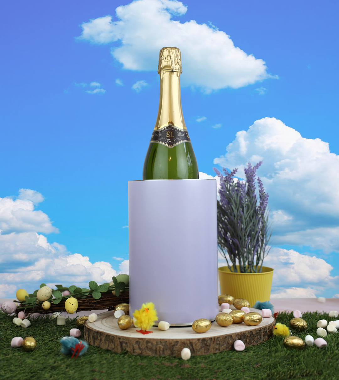 Coolenator wine cooler purple pastel color in outdoor setting with chocolate easter eggs around it.