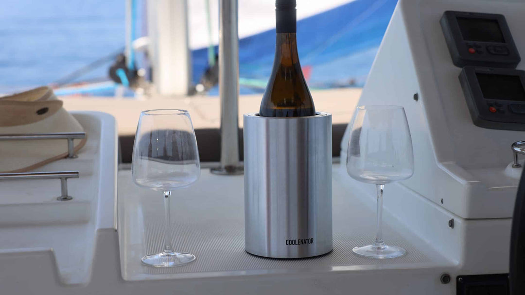 A chilled bottle of white wine being served from a Coolenator wine cooler