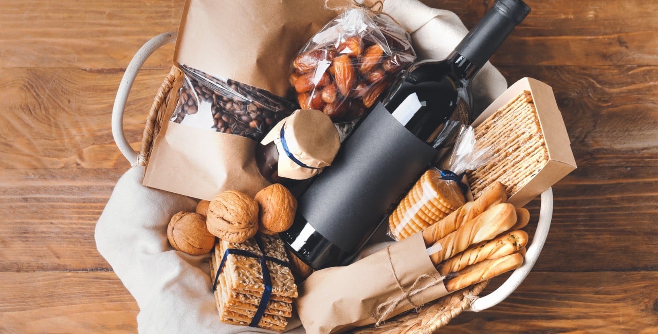 gift basket with red wine and cheeses